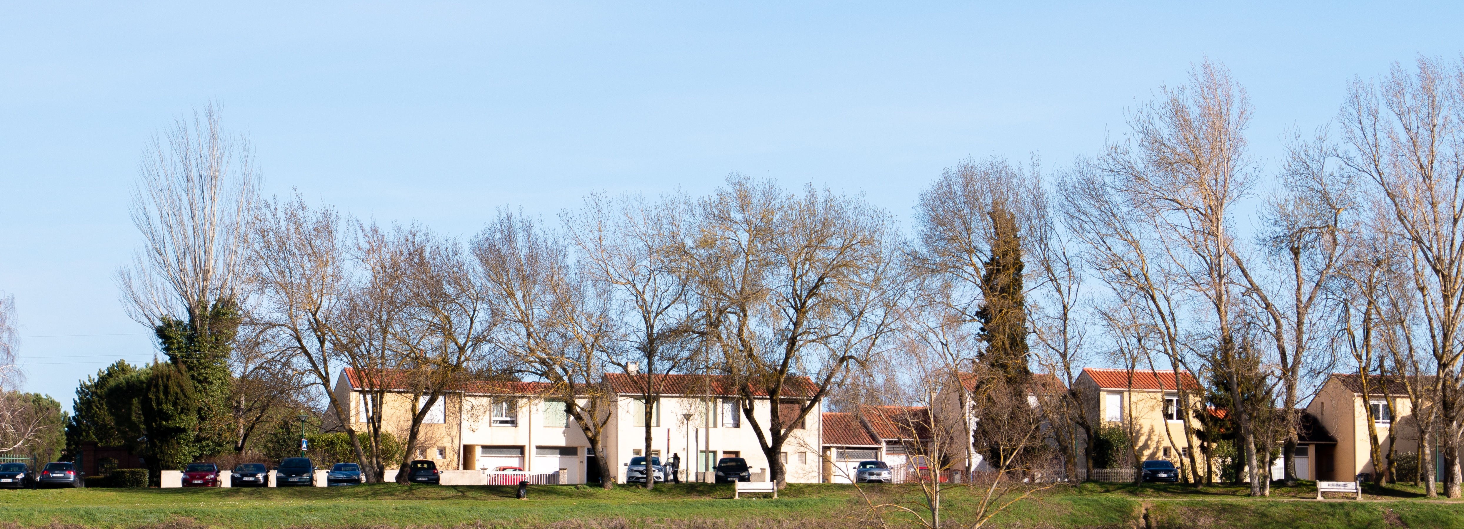 An apartment complex in a field 